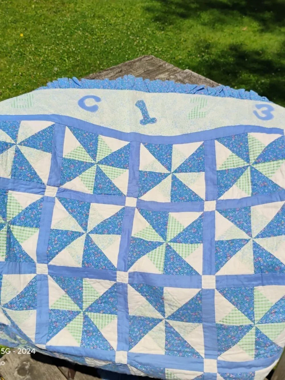 vintage hand made baby quilt ABC 123 blue green white ruffled edge crib sized